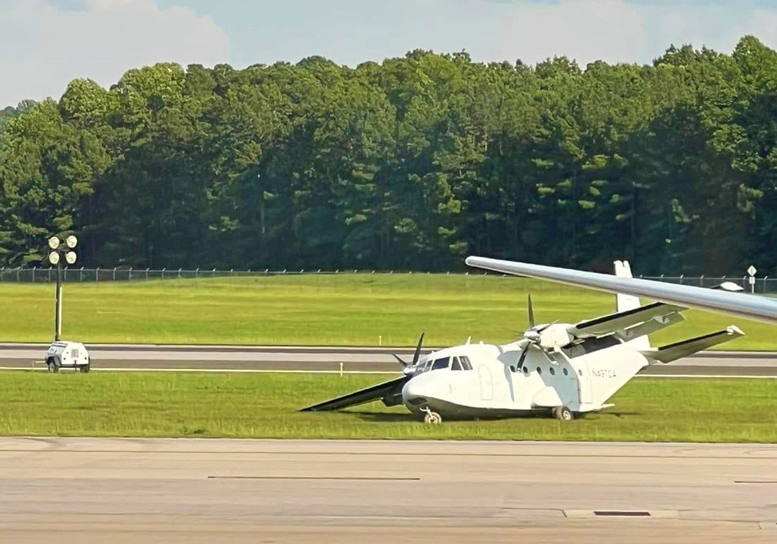 Co-Pilot  of  the  Rampart  Aviation  CASA 212 aircraft  might  have  exited the  Plane  mid air , while  aircraft  was  doing  an  emergency  Landing !