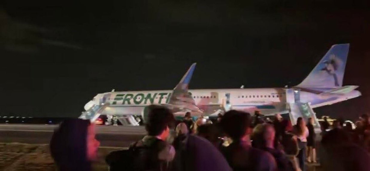 Horror at Denver Airport : Frontier Plane kills an individual walking on the Runway while taking-off.